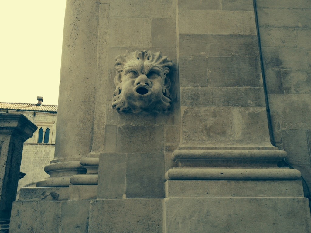 water spouts on the wall of St Blaise Church in Dubrovnik