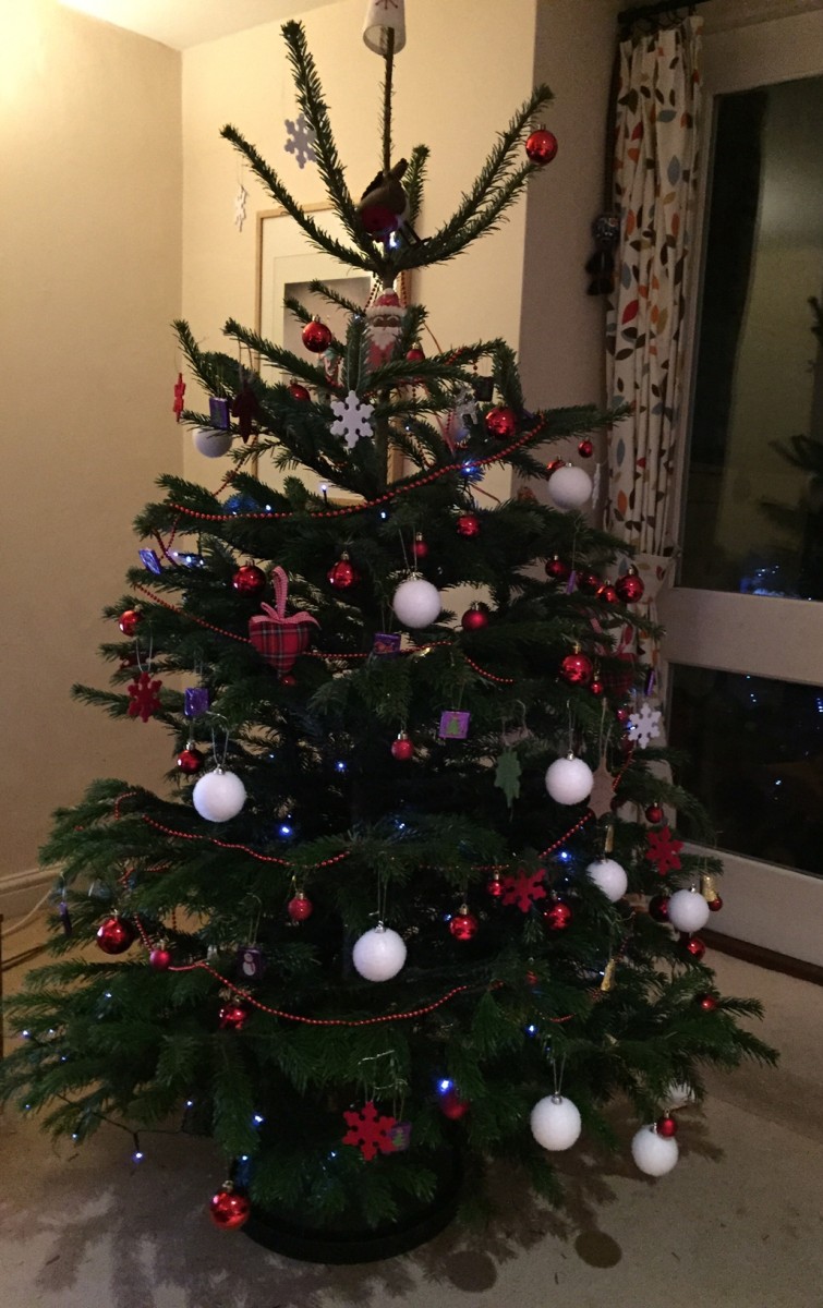 Decorate the tree with Christmas ornaments from around the world