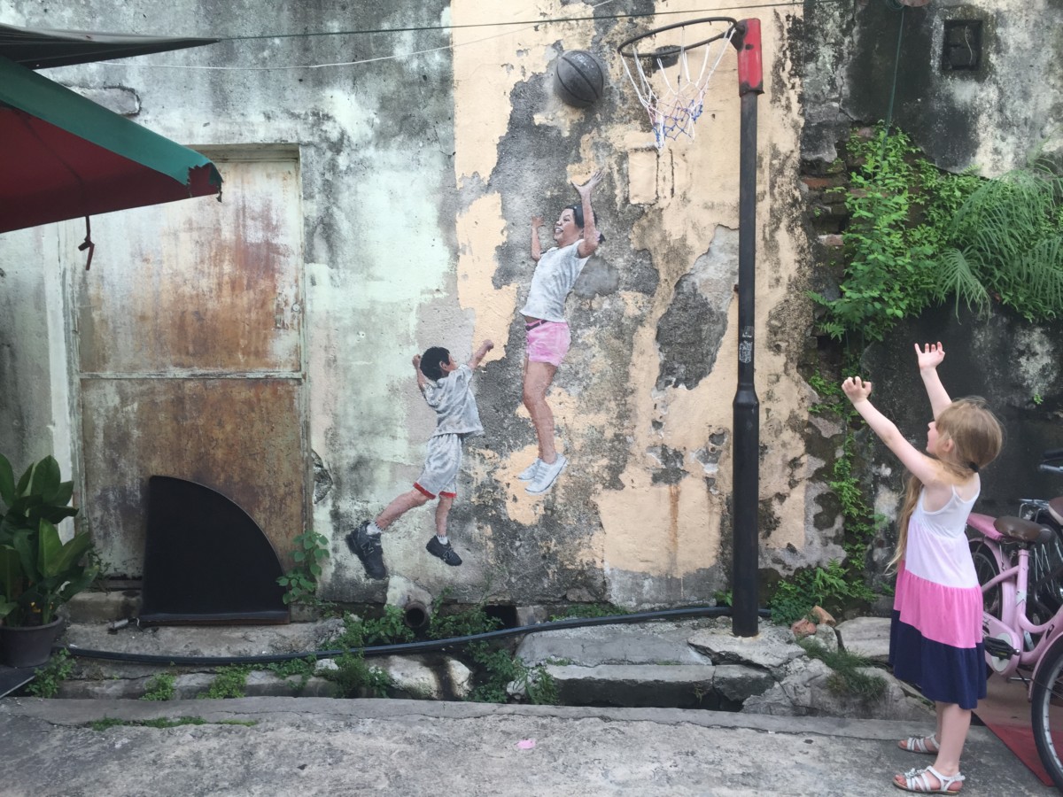 'Children playing basketball' by artist Louis Gan