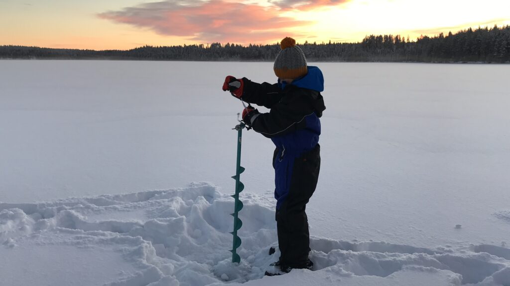 Reindeer experience in Lapland - Porohaka Reindeer Farm Rovaniemi - ice fishng - top tips for lapland