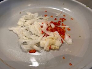 Indonesian sticky tempeh stir fry - heat the garlic onions and chilli