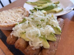 Top with sauerkraut